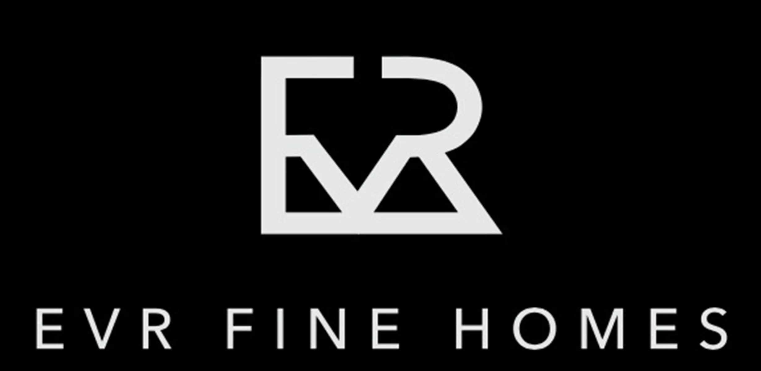 EVR Fine Homes logo.